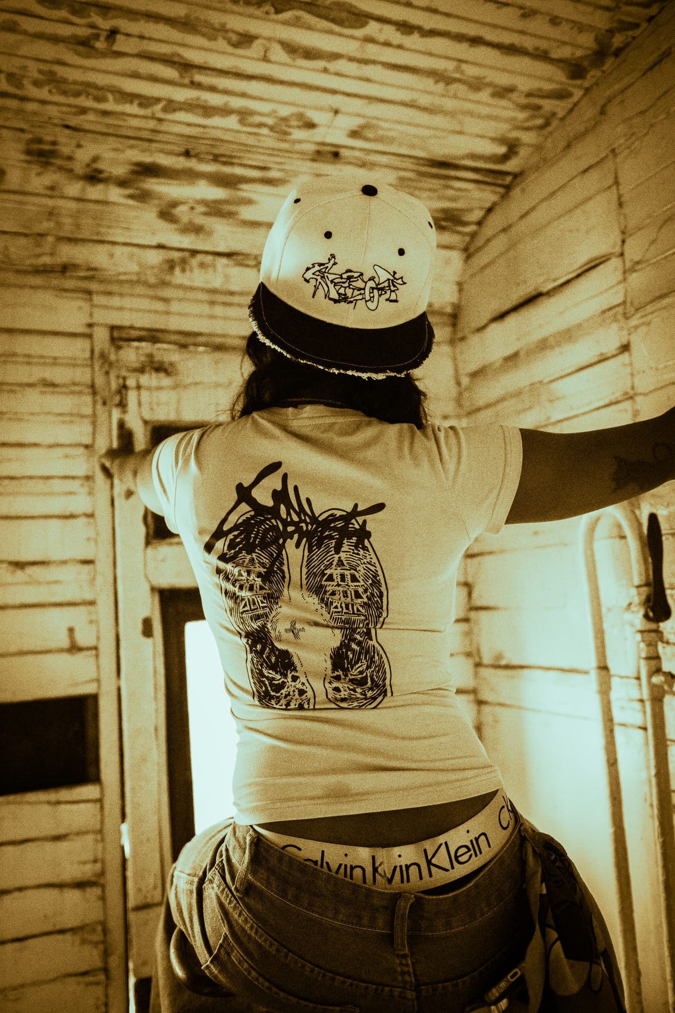 The boot-print back graphic, worn in the yard